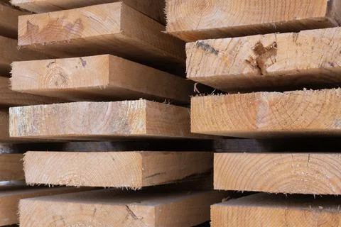 Stacked timber planks for construction and carpentry Stock Photos
