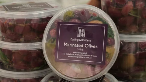 Stacked Tubs of Marinated Olives on Display at Sydney Market Stall, Australia Stock Footage 345711431