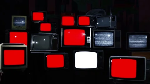 Stacked Vintage TVs turning on and off Red Screens. Blue Dark Tone. Stock Footage