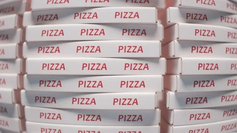 Stacked white pizza boxes with red lettering forming a wall Stock Footage 163547359