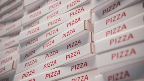Stacked white pizza boxes with red PIZZA text in close-up Stock Footage 163547589