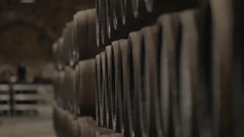 Stacked wine barrels aging inside cellar in Douro Portugal Stock Footage 327615116