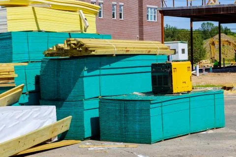 Stacked wooden building materials a stack of boards wood frame and beam const Stock Photos