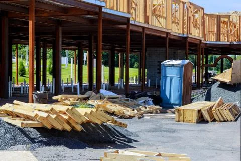 Stacked wooden building materials a stack of boards wood frame and beam const Stock Photos
