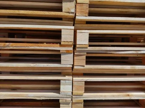 Stacked wooden pallets as background texture or backdrop Stock Photos
