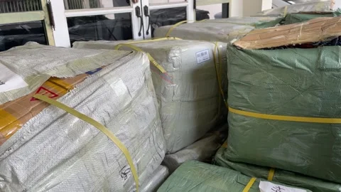Stacking and rearrange boxes at home. Package delivery and shipment, Thailand Stock Footage 248816679