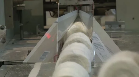 Stacking bales of cotton on the packing tape. Manufacture of medical wadding. Stock Footage 57216828
