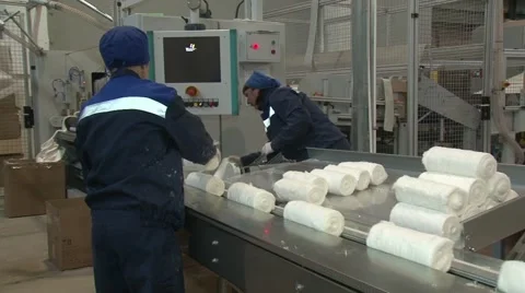 Stacking bales of cotton on the packing tape. Manufacture of medical wadding. Stock Footage 58740567