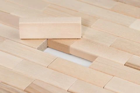 Stacking blank wood block on top. Wooden puzzles on wooden desk, top view. Th Stock Photos