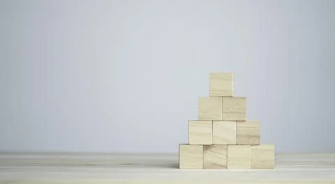 Stacking blank wooden cubes on table with copy space for input wording Stock Photos