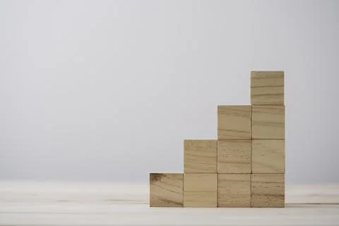 Stacking blank wooden cubes on table with copy space for input wording Stock Photos