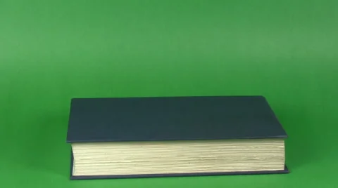 Stacking books and apple V1 - HD Stock Footage 5299200