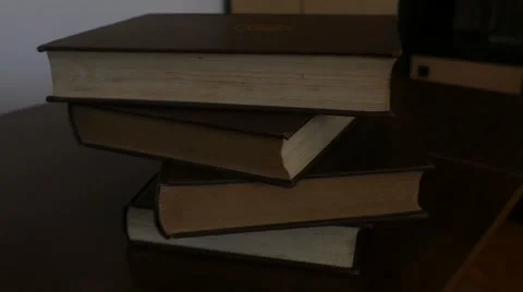 Stacking Books - Encyclopedias - Old Encyclopedia Stock Footage 48984258