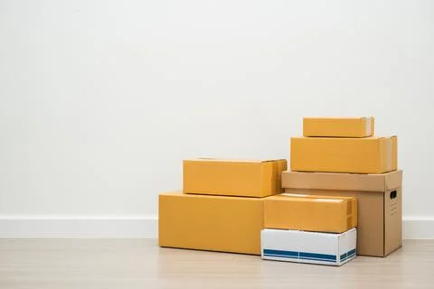 Stacking of box parcel cardboard mock up on blank space white background. Stock Photos