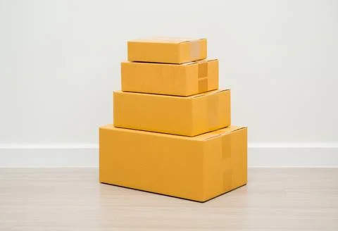 Stacking of box parcel cardboard mock up on blank space white background. Stock Photos