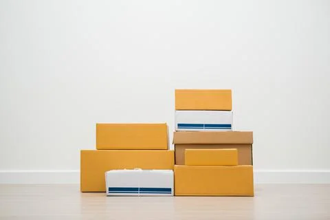 Stacking of box parcel cardboard mock up on blank space white background. Stock Photos