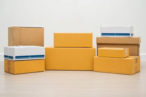 Stacking of box parcel cardboard mock up on blank space white background. Stock Photos