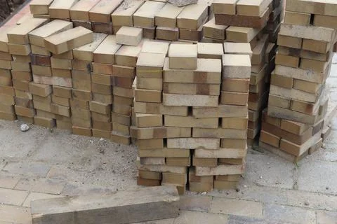 Stacking bricks for building new construction structure Stock Photos