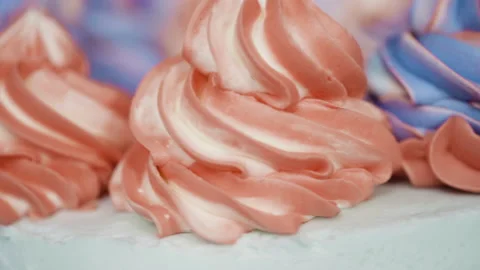 Stacking cake layers to create the round three-layer vanilla cake. Stock Footage 143704576