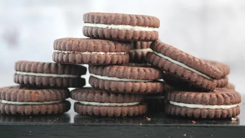 Stacking chocolate cookies in a creative way Stock Footage 317281354