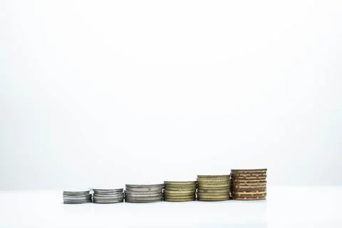 Stacking of coin isolated on white background. Copy space. Business concept. Stock Photos