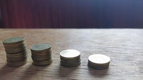 Stacking Coins, Building Dreams: Visualizing Financial Growth and Prosperity Stock Photos