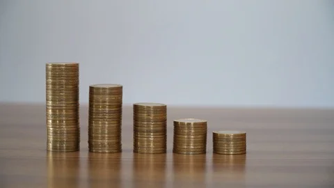 Stacking Coins in Columns Stock Footage 85651533