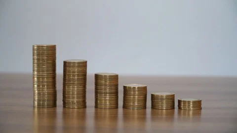 Stacking Coins in Columns Stock Footage 85651568