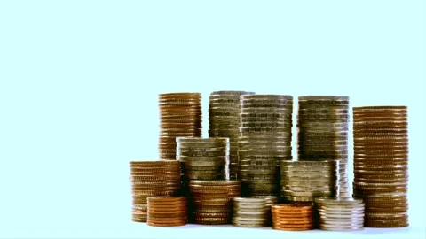 Stacking coins represent growth and accumulation of wealth now. Stock Footage 340623800