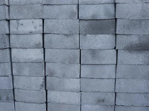 Stacking of concrete bricks laying on the floor Foto stock