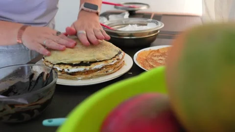 Stacking Crepe Cake - Adding New Crepe To Layers Filled With Chocolate, Cream Stock Footage 321665993