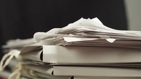 Stacking folders with documents in a stack with hands, counting files, searching Stock Footage 156750890