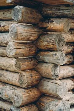 Stacking of logs of old house Stock Photos