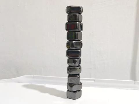Stacking Magnet on White Background Foto stock