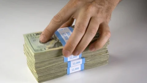 Stacking Money On The Table Stock Footage