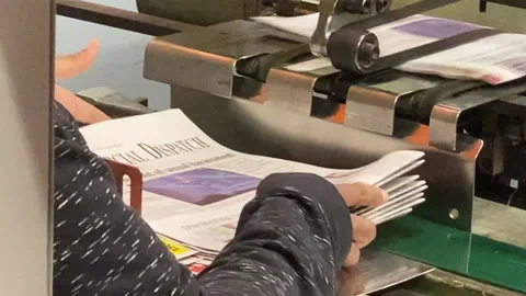 Stacking Newspapers Hot Off the Press Stock Footage 164628597