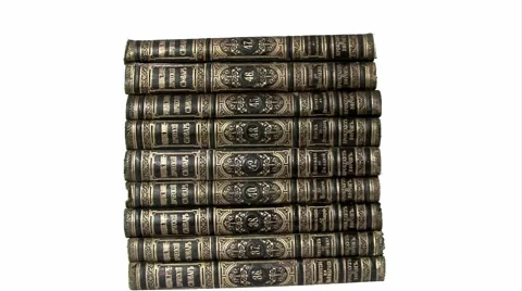Stacking up old books isolated on white Stock Footage 43504736