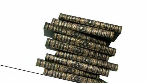 Stacking up old books isolated on white Video stock 43913483