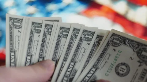 Stacking One Dollar Bills in Hand 스톡 동영상 277087505