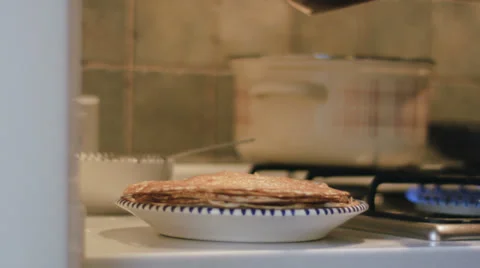 Stacking pancakes time-lapse Stock Footage 35562742