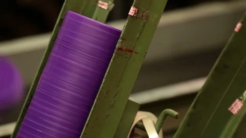 Stacking plastic lids Stock Footage 77048731