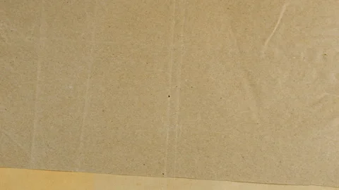 Stacking sheets of handmade paper with natural vegetable dye in earth tones. Stock Footage 330241017