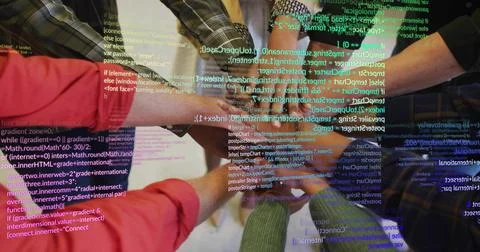 Stacking six colleagues' hands forming team unity in office workspace, with v Stock Photos