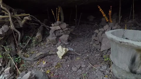 Stacking Stones in Mountain Cave with Offering, Laos Stock-Footage 279252888