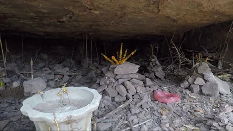 Stacking Stones in Mountain Cave with Offering, Laos Stock-Footage 279253195
