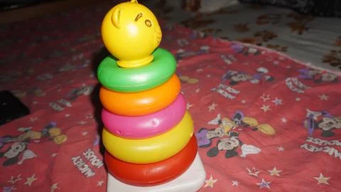 Stacking toys help in developing fine motor skills Stock Photos