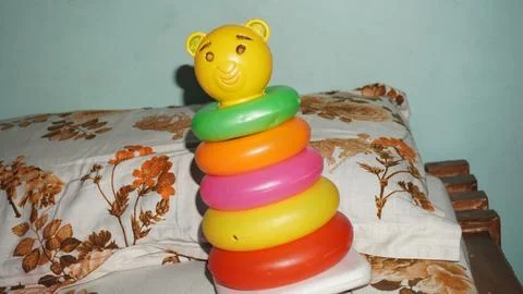 Stacking toys help in developing fine motor skills Stock Photos