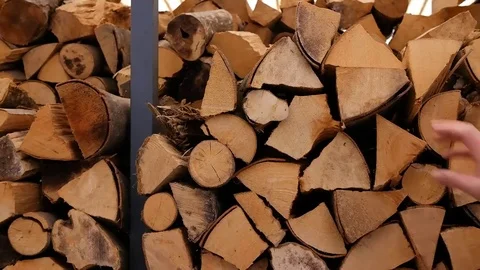 Stacking wood into a pile2 Stock Footage 70090208