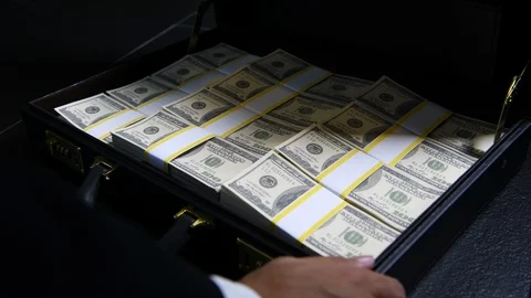 Stacks of 100 dollar bills in a briefcase , briefcase full of money . Stock Footage