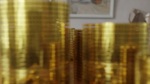 Stacks of bitcoin coins on the table Stock Footage 253591361